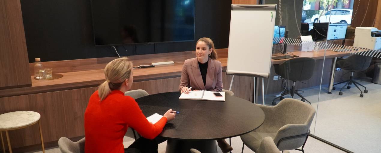 Book the private meeting room with 5 chairs and a TV screen