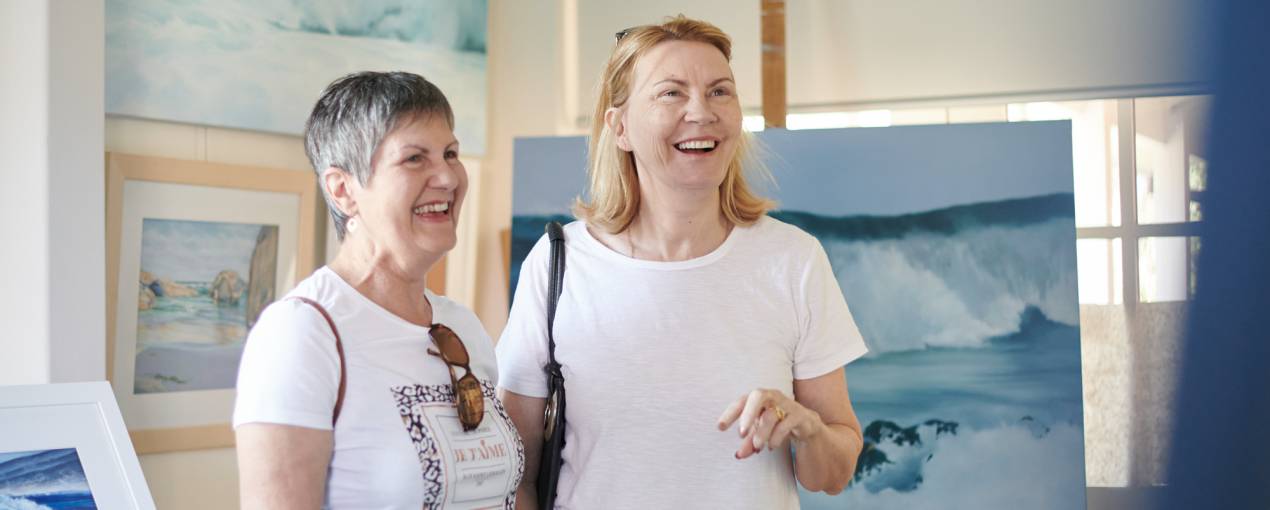 Visitors enjoying a visit to Fiona Buchanan's studio at Goolugatup Heathcote, Melville Open Studios 2020