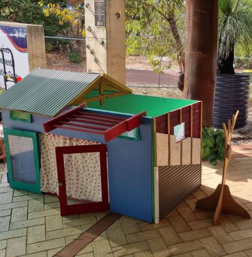 Join a workshop to learn more. This solar passive house model was featured at a community event.