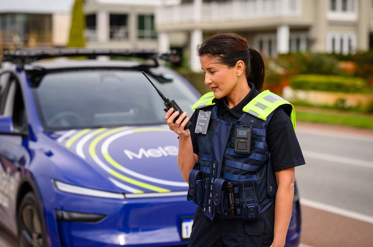 MelSafe officers in front of vehicle.