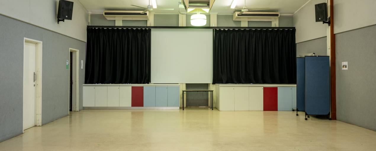 There is a projector and screen which can be used