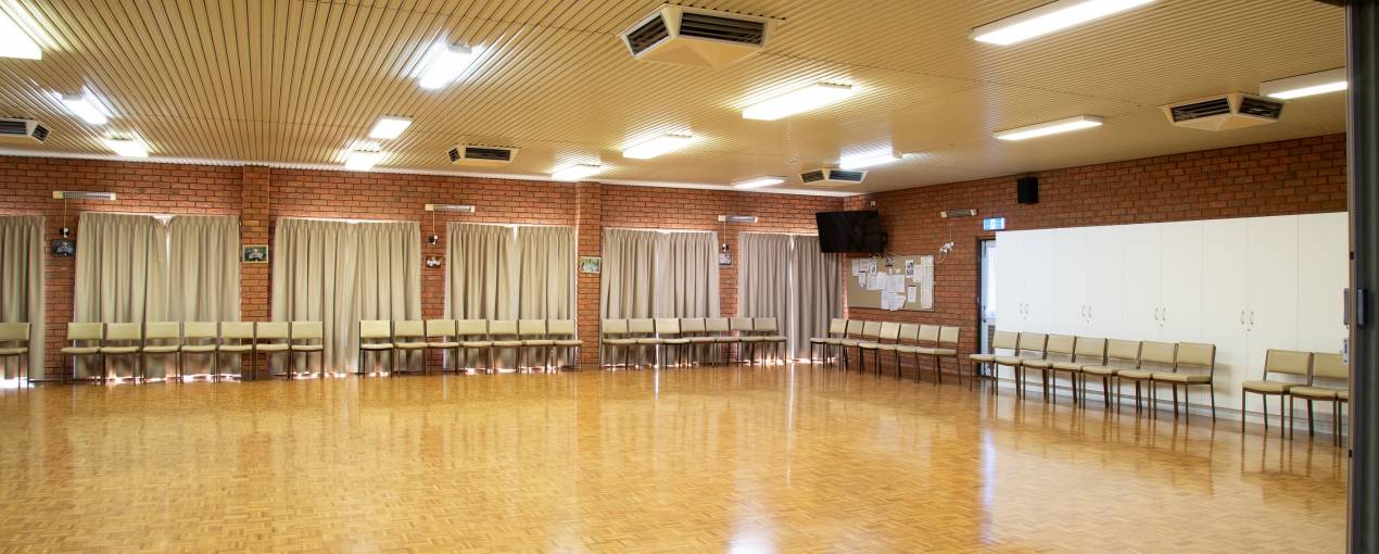 The main hall has parquetry floors