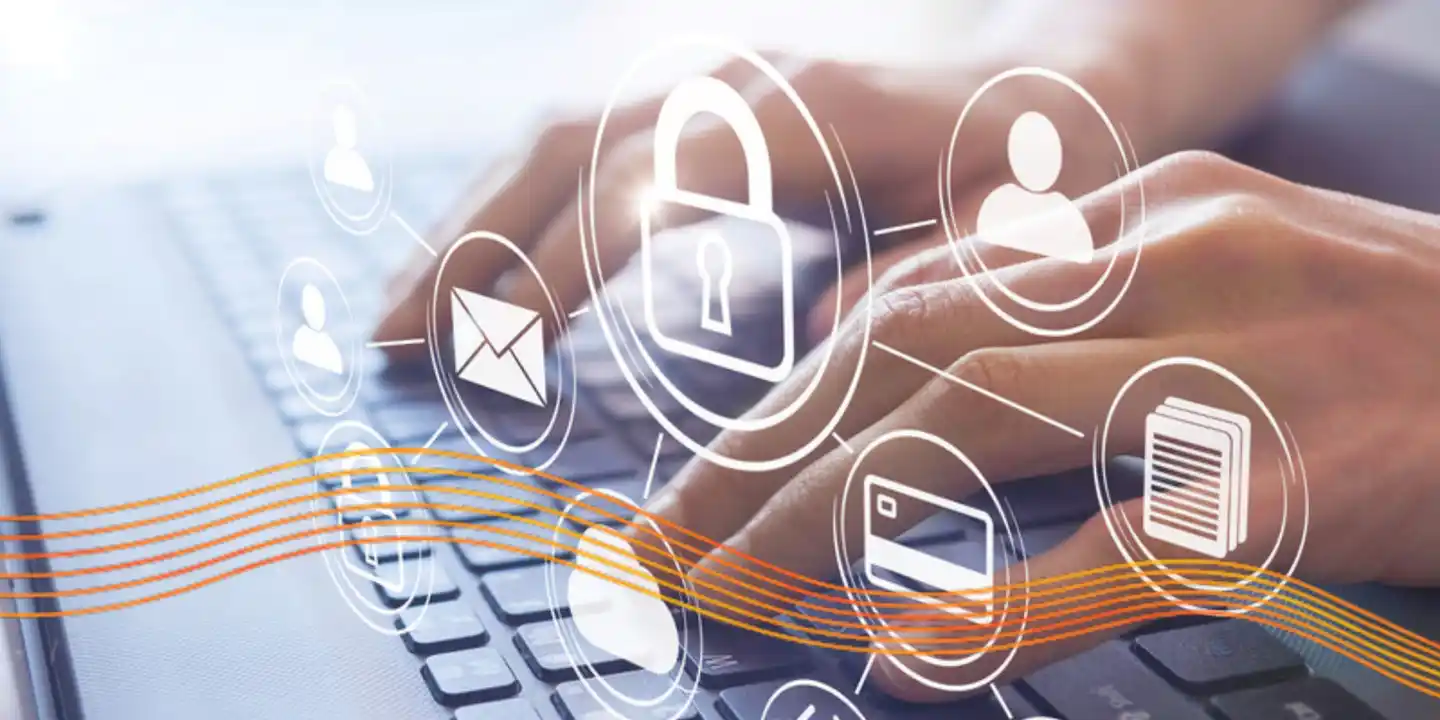 Hands type on an open laptop, an overlay displays icons: a lock, an envelope, a credit card, a stack of papers
