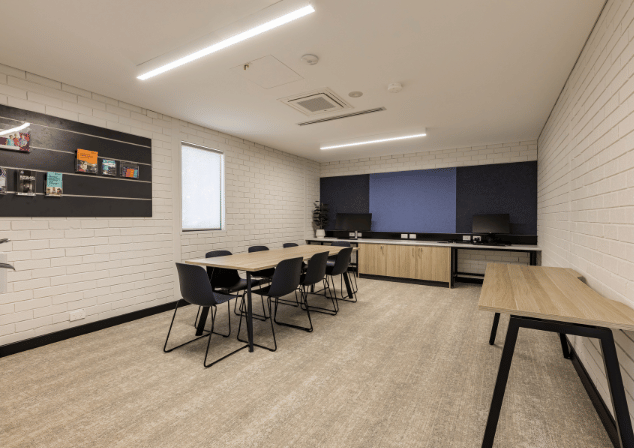 Image of the meeting room at Blue Gum Community Centre, features include 8 seating options and an extra table