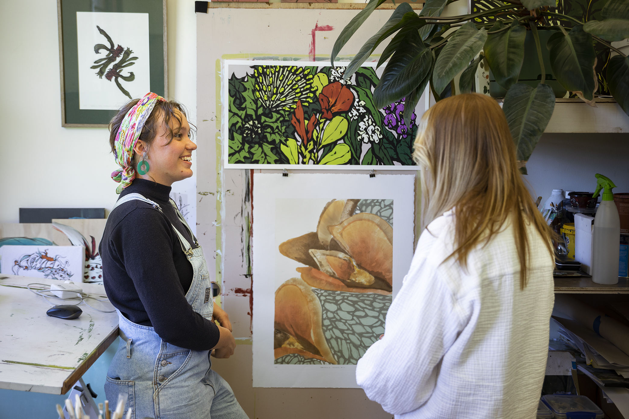 woman looking at artwork