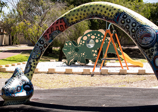 Children's playground with dinosaurs