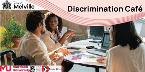 People sitting at a table talking with a laptop