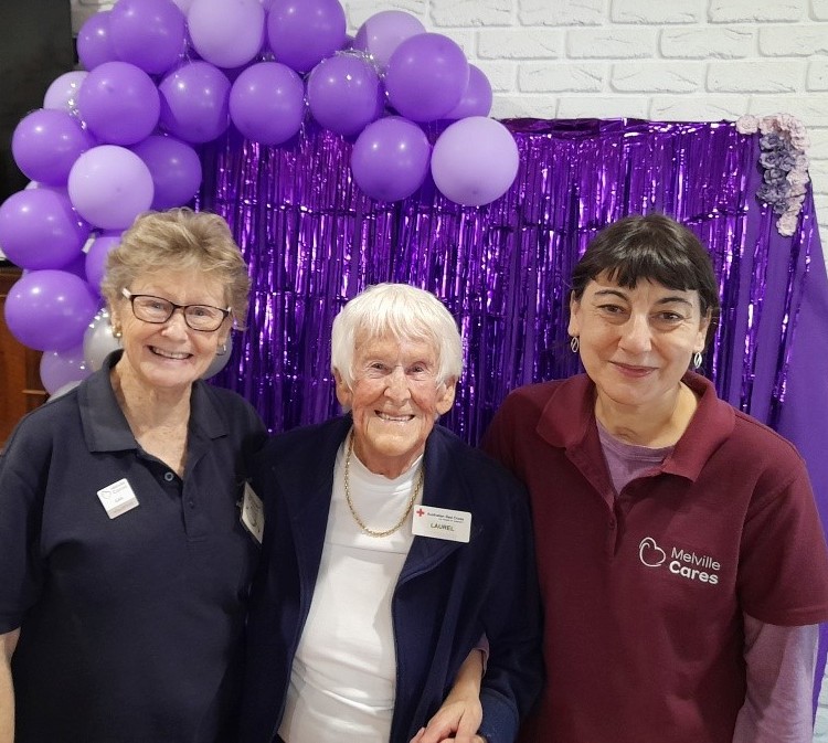 Three volunteers from Melville Cares