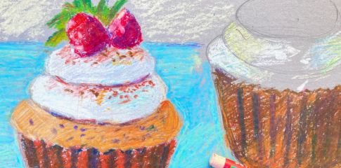 A pencil drawing of two cupcakes