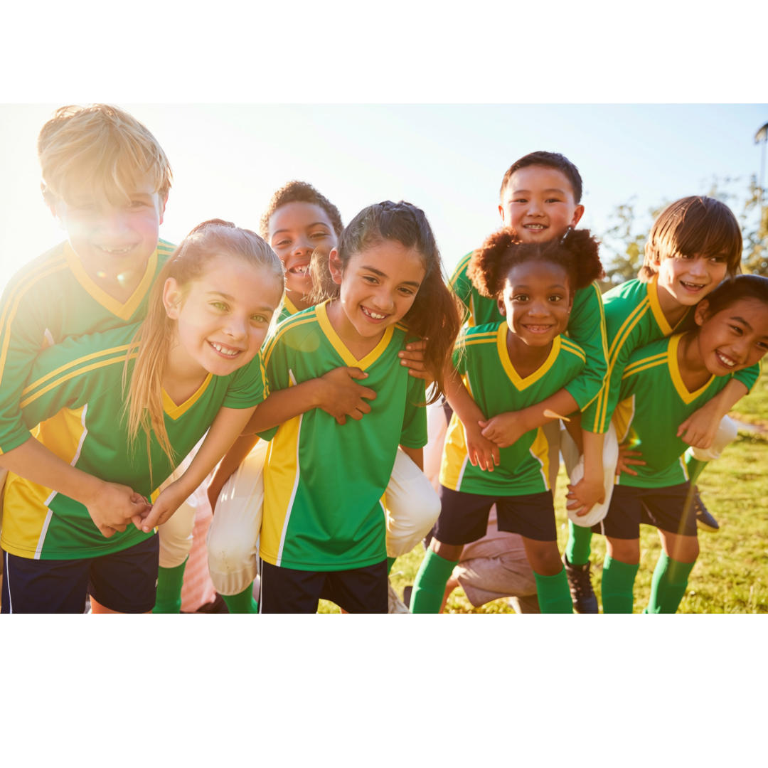 Picture of kids smiling, wearing green and yellow for sport 