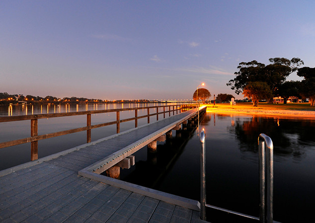 Jetty with sun setting